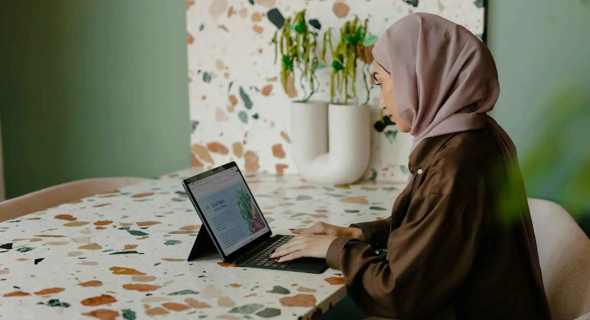 Woman browsing laptop